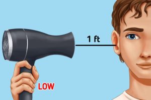 foolproof way to get water out of ear